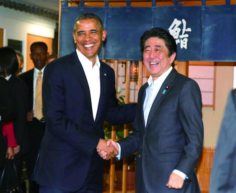 美國總統歐巴馬和日本首相安倍晉三都面臨政治跛腳命運，只好進行一場豪賭。圖片來源:達志影像/路透社   