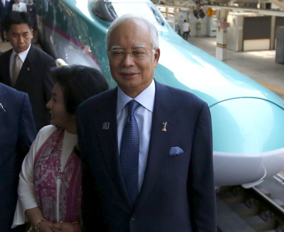 馬來西亞總理納吉布（右）涉及近7億美元的貪腐案，案情持續升高。圖片來源：達志影像/路透社資料照片   