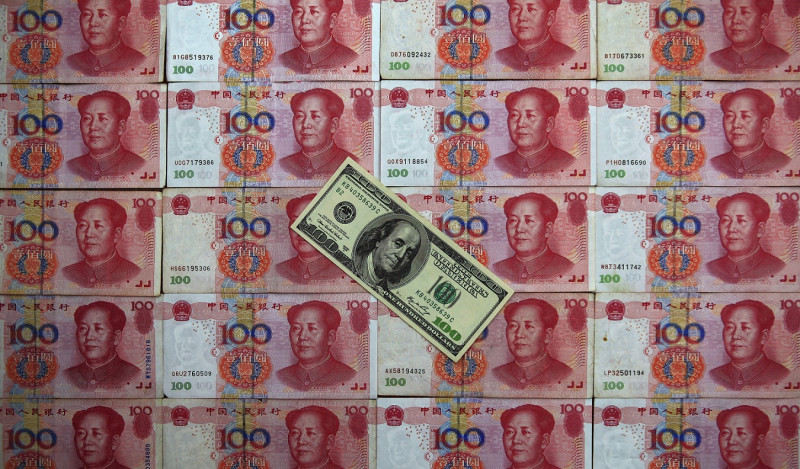 中國人行上周連續3天引導人民幣貶值，引發國際市場大幅震盪，再度顯示美元指數已經過時，無法再反映匯市實際情況。圖片來源：達志影像/路透社   