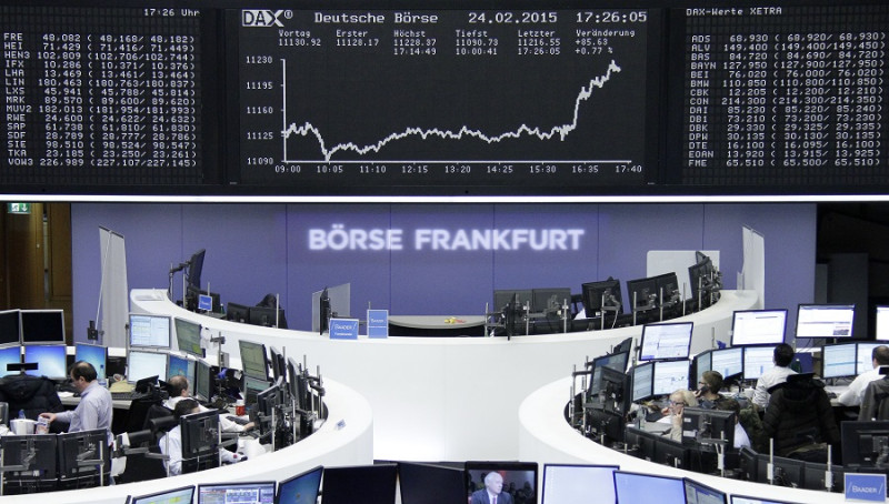 歐洲央行宣布9日啟動QE後，歐股表現亮眼，歐元則貶至11年半新低。圖片來源：達志影像/路透社   