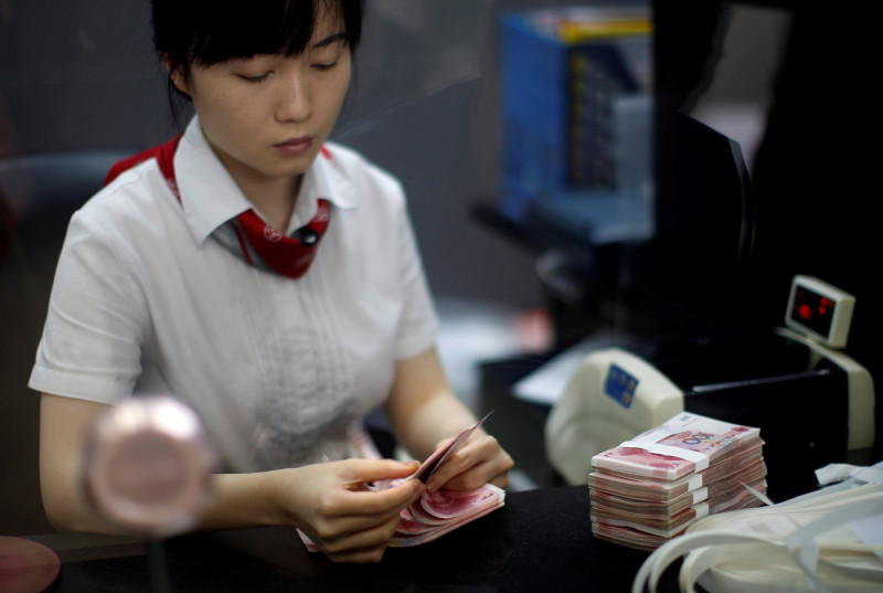 中國央行對人民幣兌美元匯價的刻意引導貶勢似乎將使得跌勢擴大。圖：達志影像/路透社   