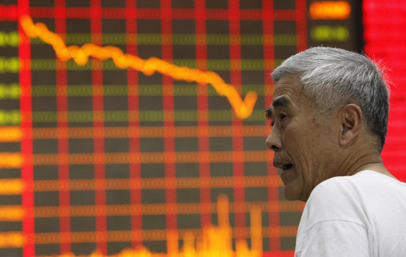 中國、香港股市15日均告重挫。圖片來源：達志影像/路透社資料照片   