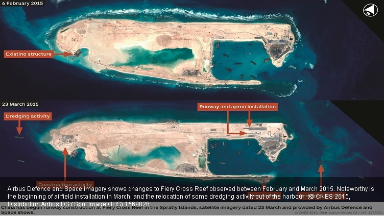 權威軍事刊物《IHS簡氏防務週刊》公布的衛星照片顯示，中國正在南沙群島中最大的人造島永暑島修建飛機跑道。圖：翻攝自《IHS簡氏防務週刊》網站   