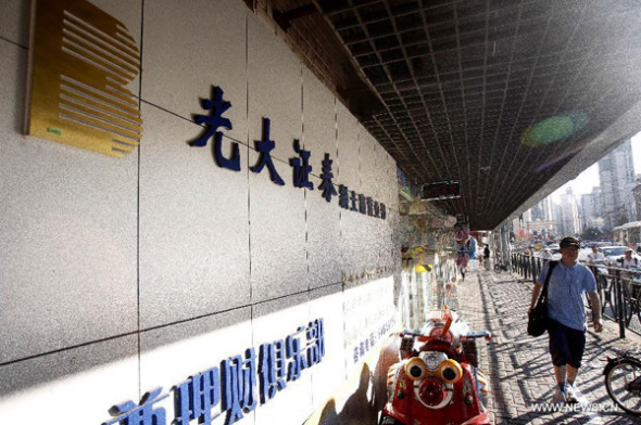 據彭博報導，大陸股市上週五（16日）因光大證券（Everbright Securities Co.）交易系統出錯，導致指數大漲，讓投資人空歡喜一場。圖片來源：翻攝自網路。   