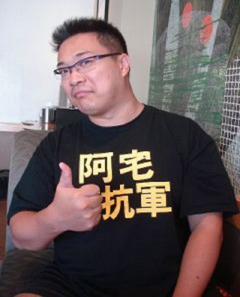 因為穿著印有「阿宅反抗軍」字樣的T恤，宅男朱學恆逛上海世博遭公安留置，最後還意外獲贈黑色T恤一件。圖片來源：newtalk資料照片   