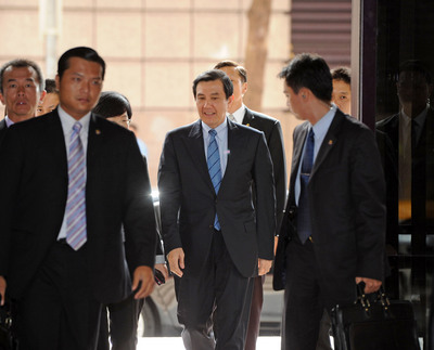 總統馬英九（中）13日在台北國際會議中心，出席「2014能源願景高峰論壇」開幕典禮。圖：中央社   